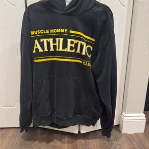 Muscle Mommy Black Hoodie with Yellow Athletic Print